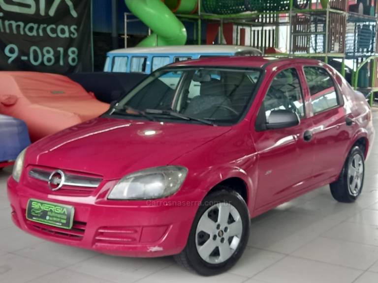 CHEVROLET - PRISMA - 2009/2009 - Vermelha - R$ 17.900,00